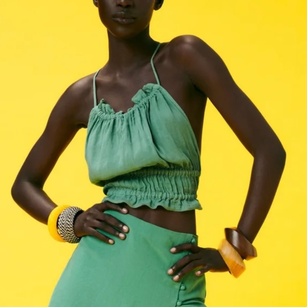 Open back green linen blend top